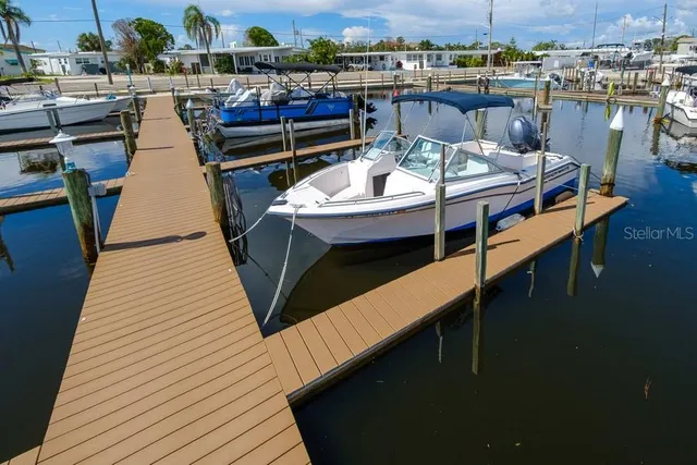 a view of a balcony with chairs