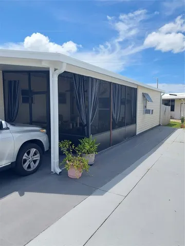 a view of a lake with a house