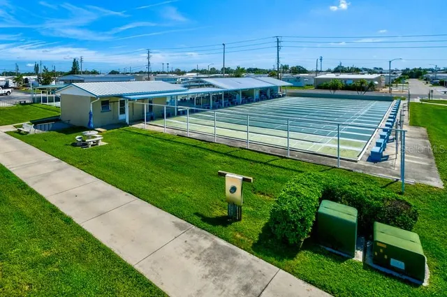 a house view with a backyard space