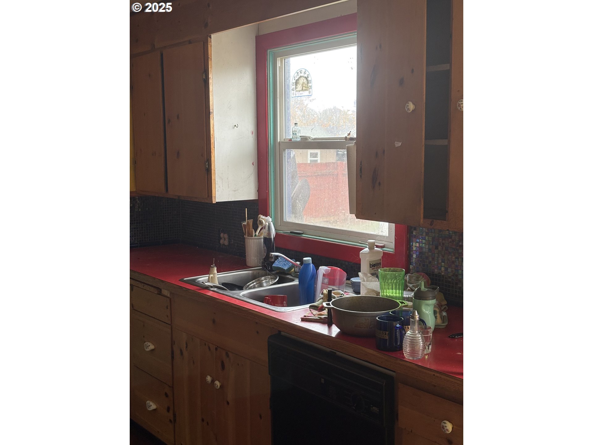 4135 Concord Street Eugene, OR 97402 - Photo 4 of 14 a bathroom with a sink and a mirror