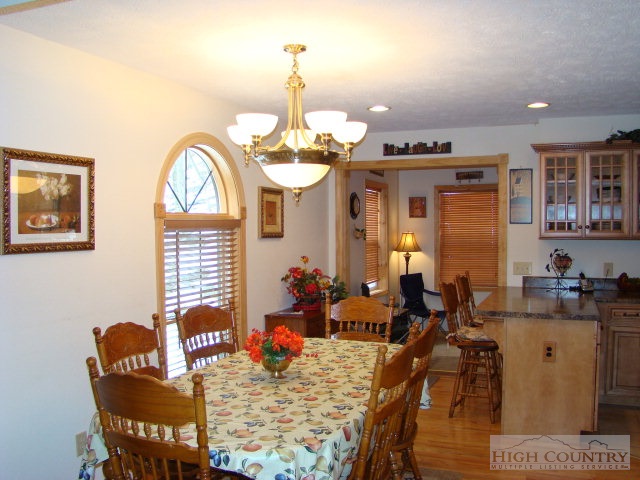 3075 Meat Camp Road Boone, NC 28607 - Photo 13 of 17 a view of a dining room with furniture