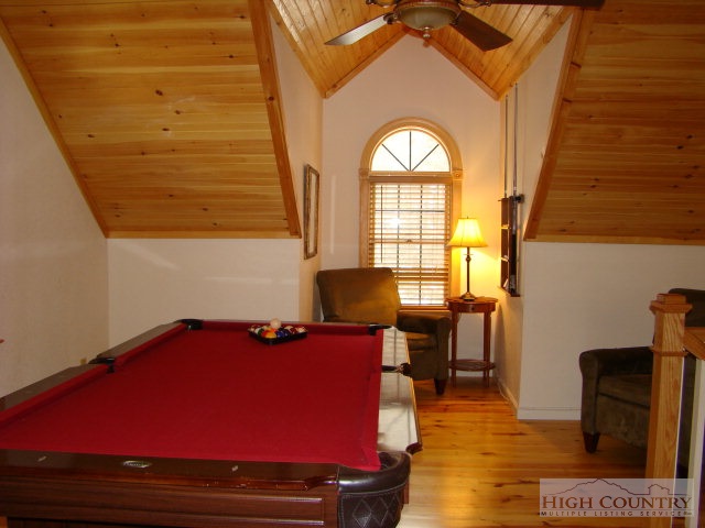 3075 Meat Camp Road Boone, NC 28607 - Photo 15 of 17 a living room with furniture and a window
