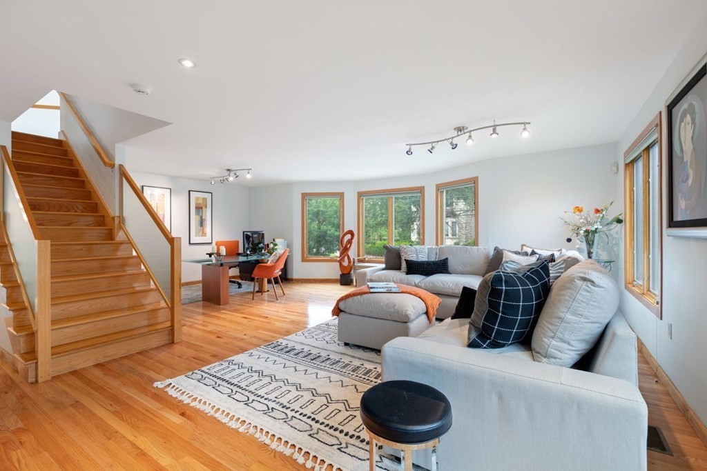 15 Deborah Road Newton, MA 02459 - Photo 12 of 33 a living room with furniture and a wooden floor