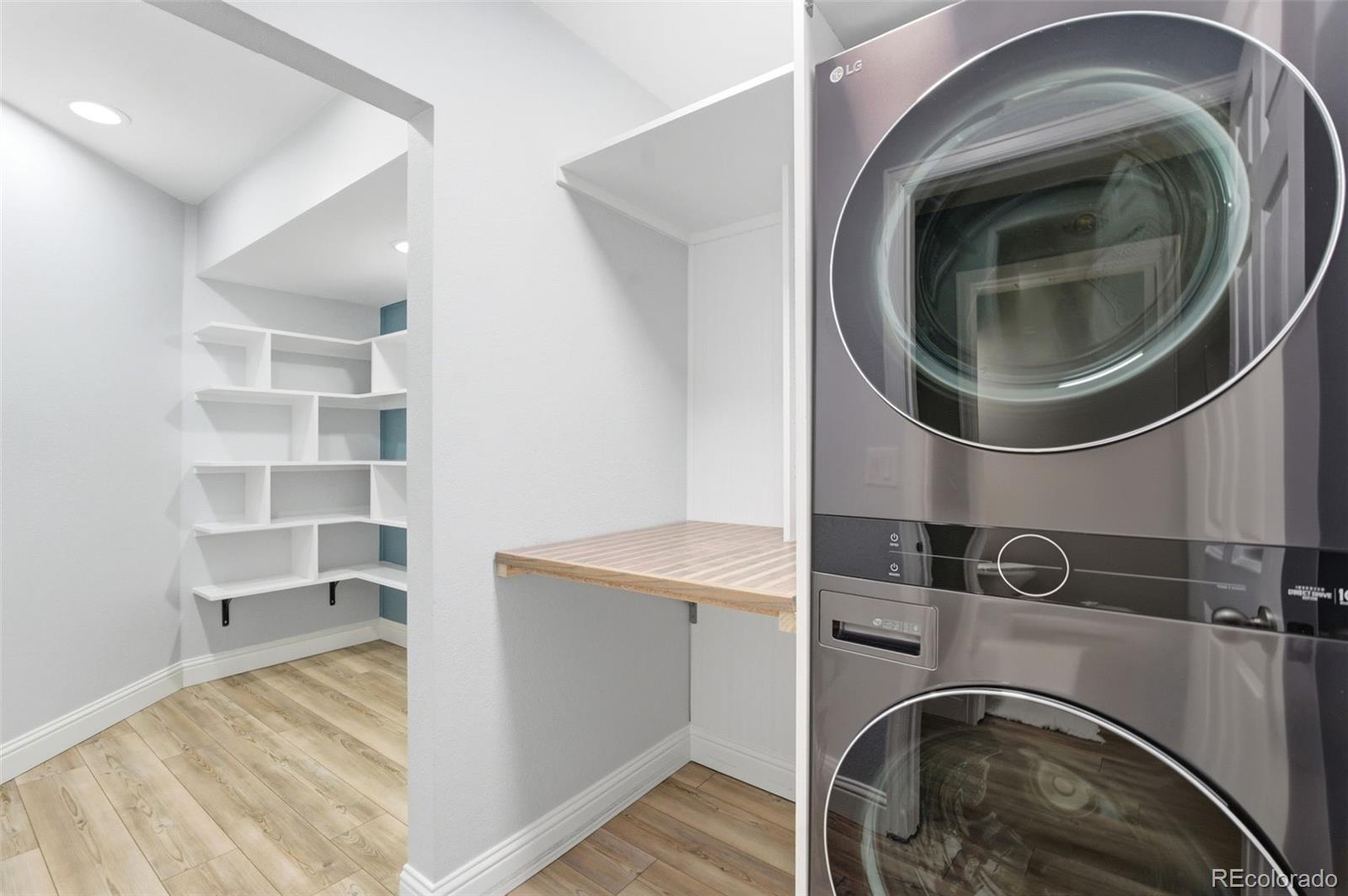 6621 Millstone Place Highlands Ranch, CO 80130 - Photo 23 of 48 a utility room with dryer and washer