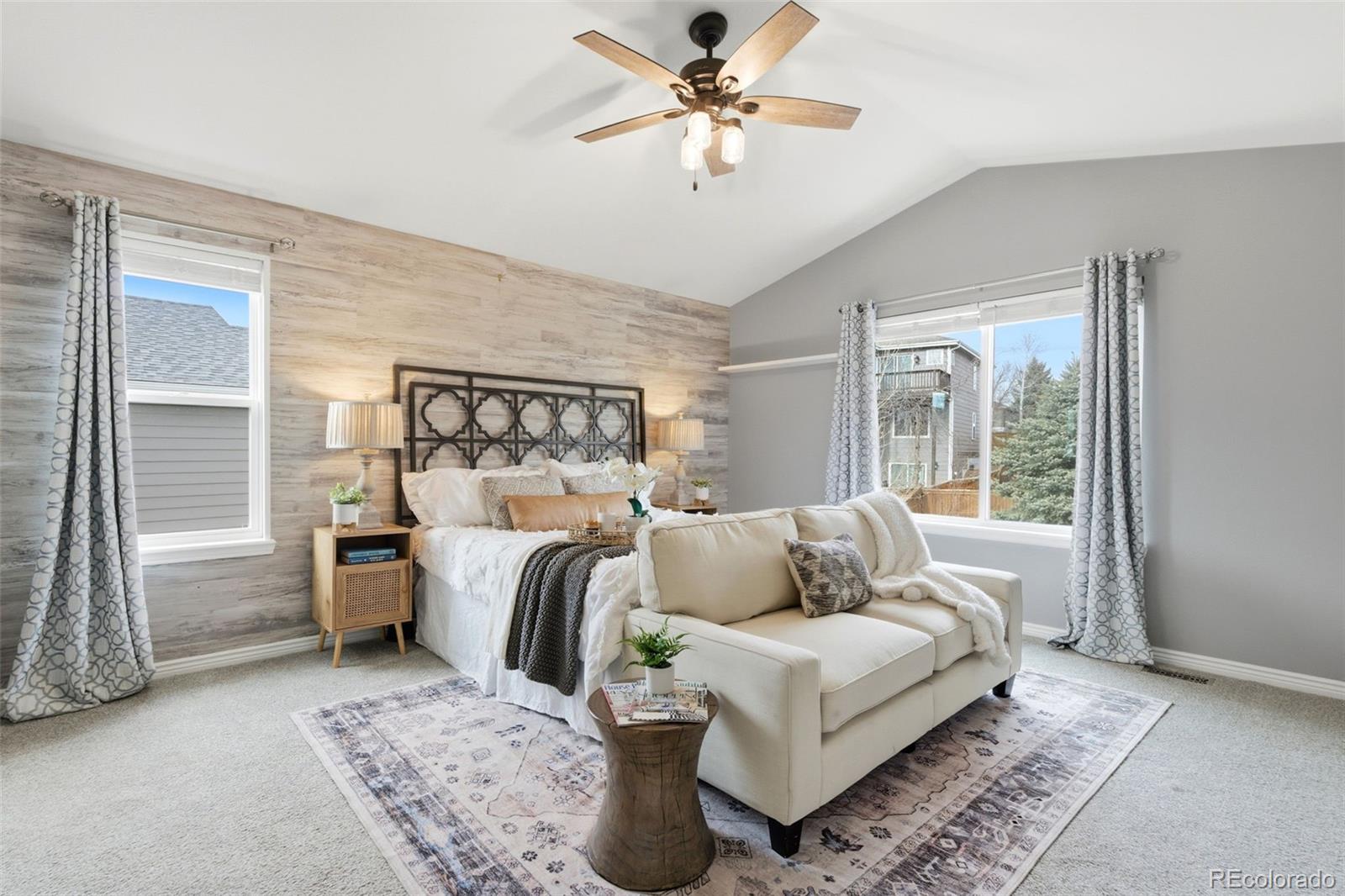 6621 Millstone Place Highlands Ranch, CO 80130 - Photo 26 of 48 a bed room with a bed and a couch