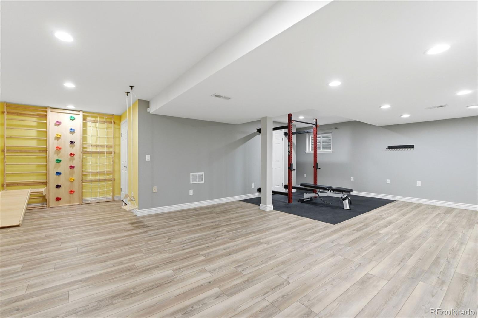 6621 Millstone Place Highlands Ranch, CO 80130 - Photo 40 of 48 a view of a room with gym equipment