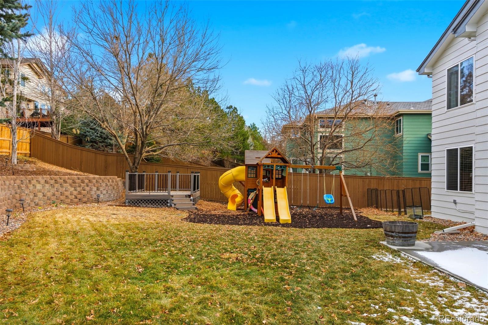 6621 Millstone Place Highlands Ranch, CO 80130 - Photo 43 of 48 a view of a park with slide