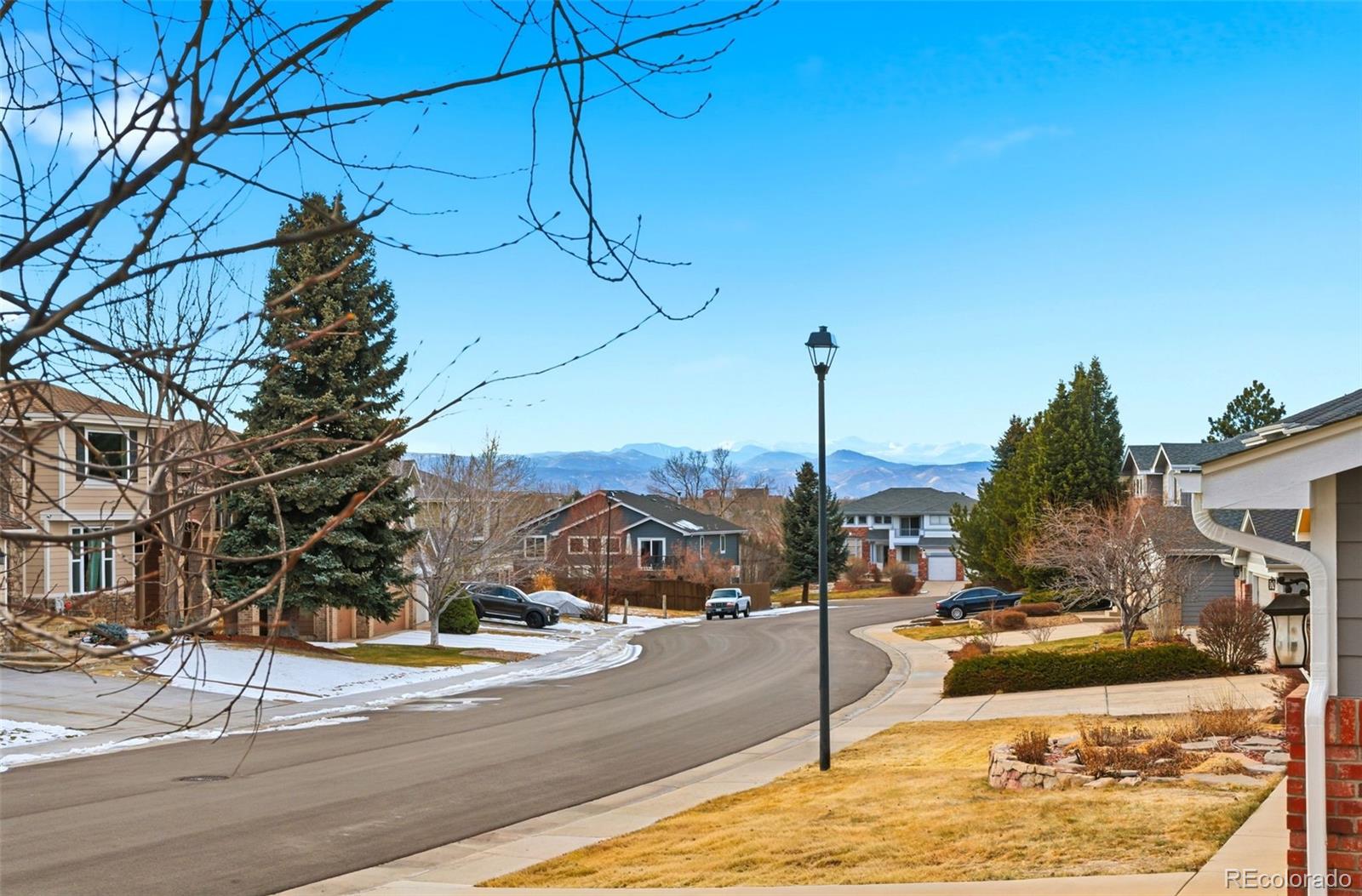 6621 Millstone Place Highlands Ranch, CO 80130 - Photo 45 of 48 a view of a city street and trees