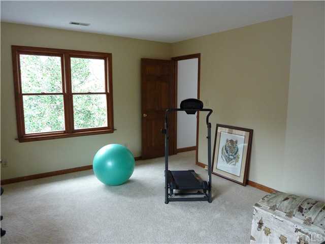 1924 Wilton Circle Raleigh, NC 27615 - Photo 16 of 22 a living room with furniture and a window