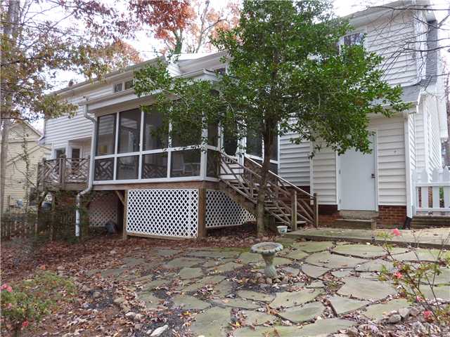 1924 Wilton Circle Raleigh, NC 27615 - Photo 21 of 22 a view of a backyard with a large tree