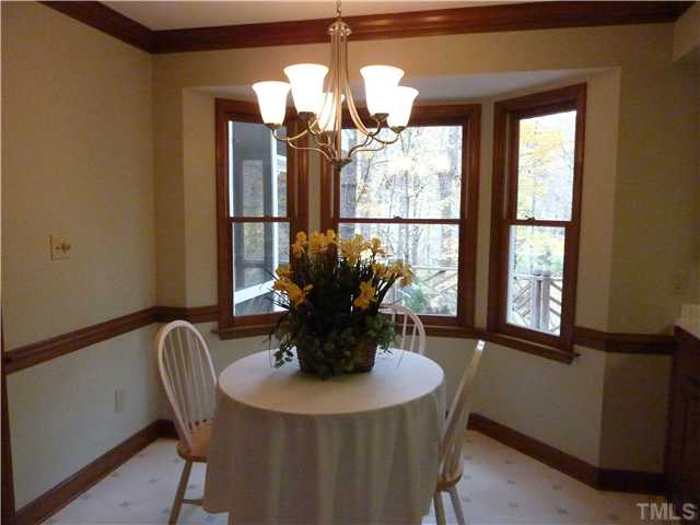 1924 Wilton Circle Raleigh, NC 27615 - Photo 7 of 22 a view of a dining room with furniture and window