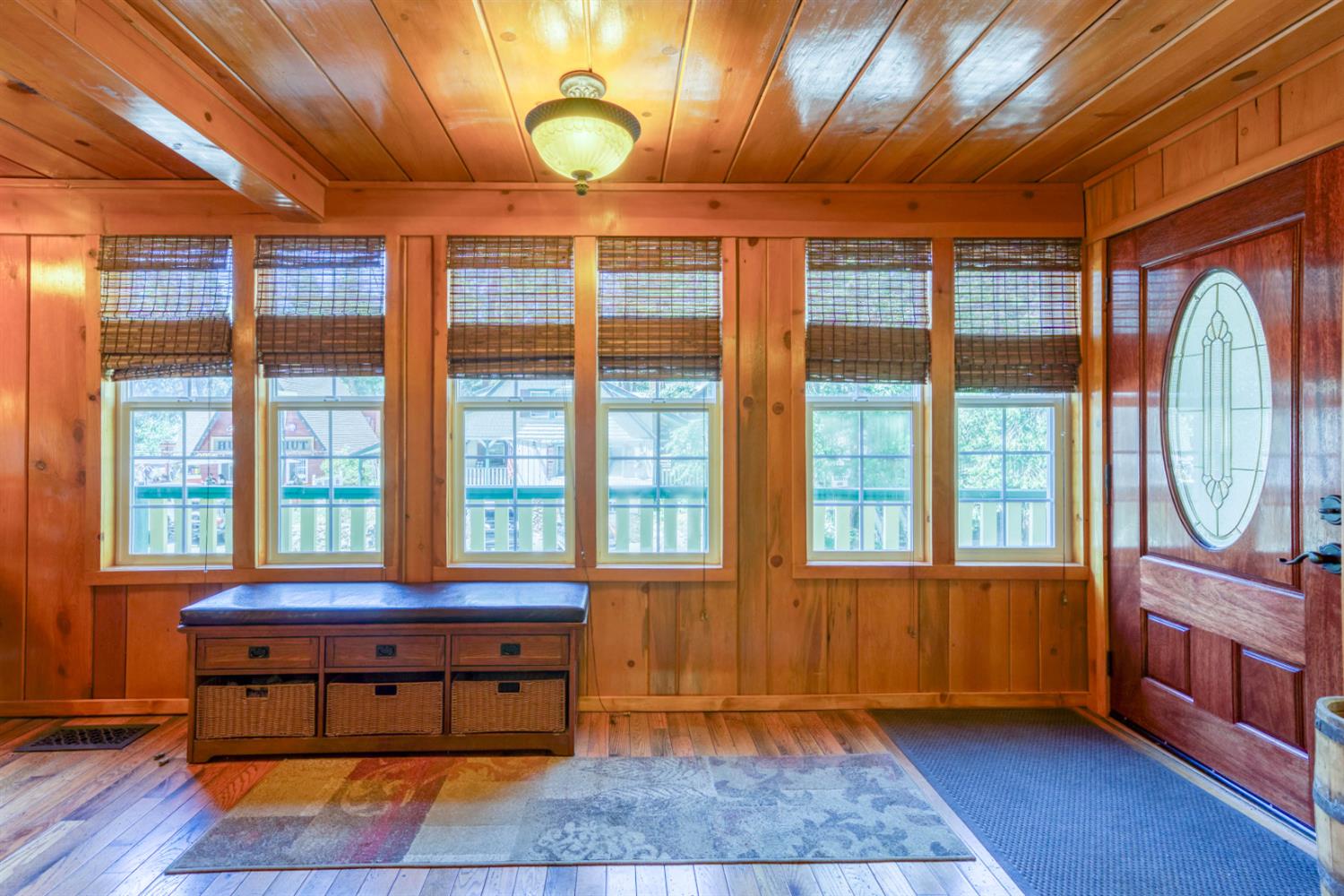 42025 Tollhouse Road Shaver Lake, CA 93664 - Photo 5 of 64 a room with wooden floors and windows