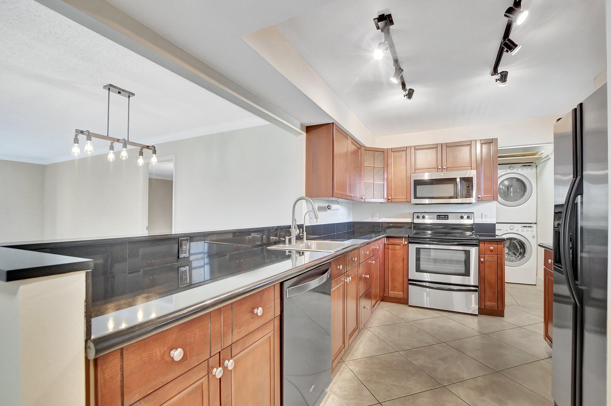 6461 Northwest 2nd Avenue, Unit 516 Boca Raton, FL 33487 - Photo 1 of 43 kitchen