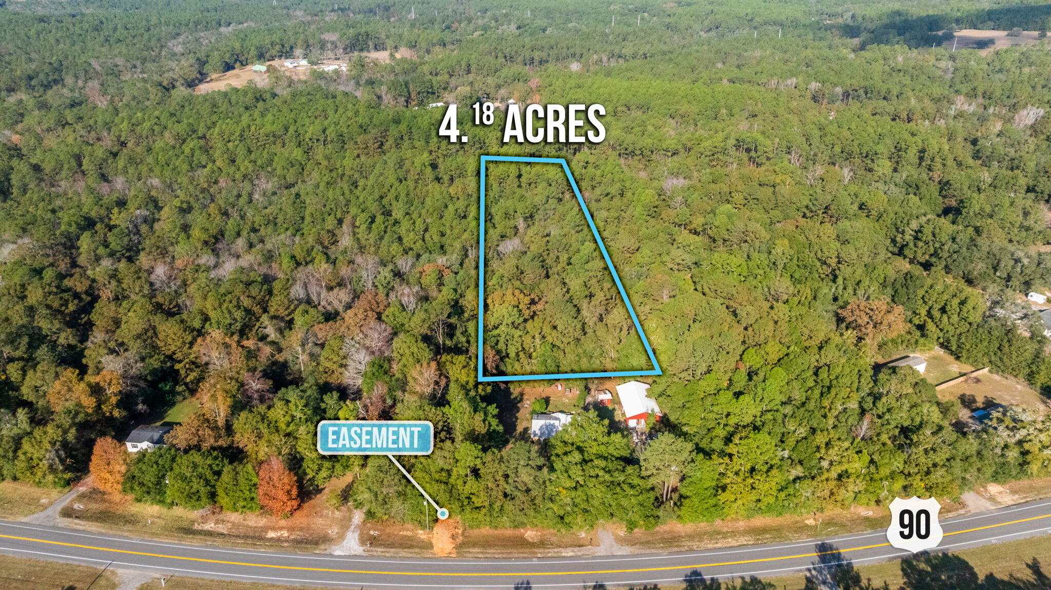 90 West Baker Baker, FL 32531 - Photo 4 of 10 a sign that is on the side of a building