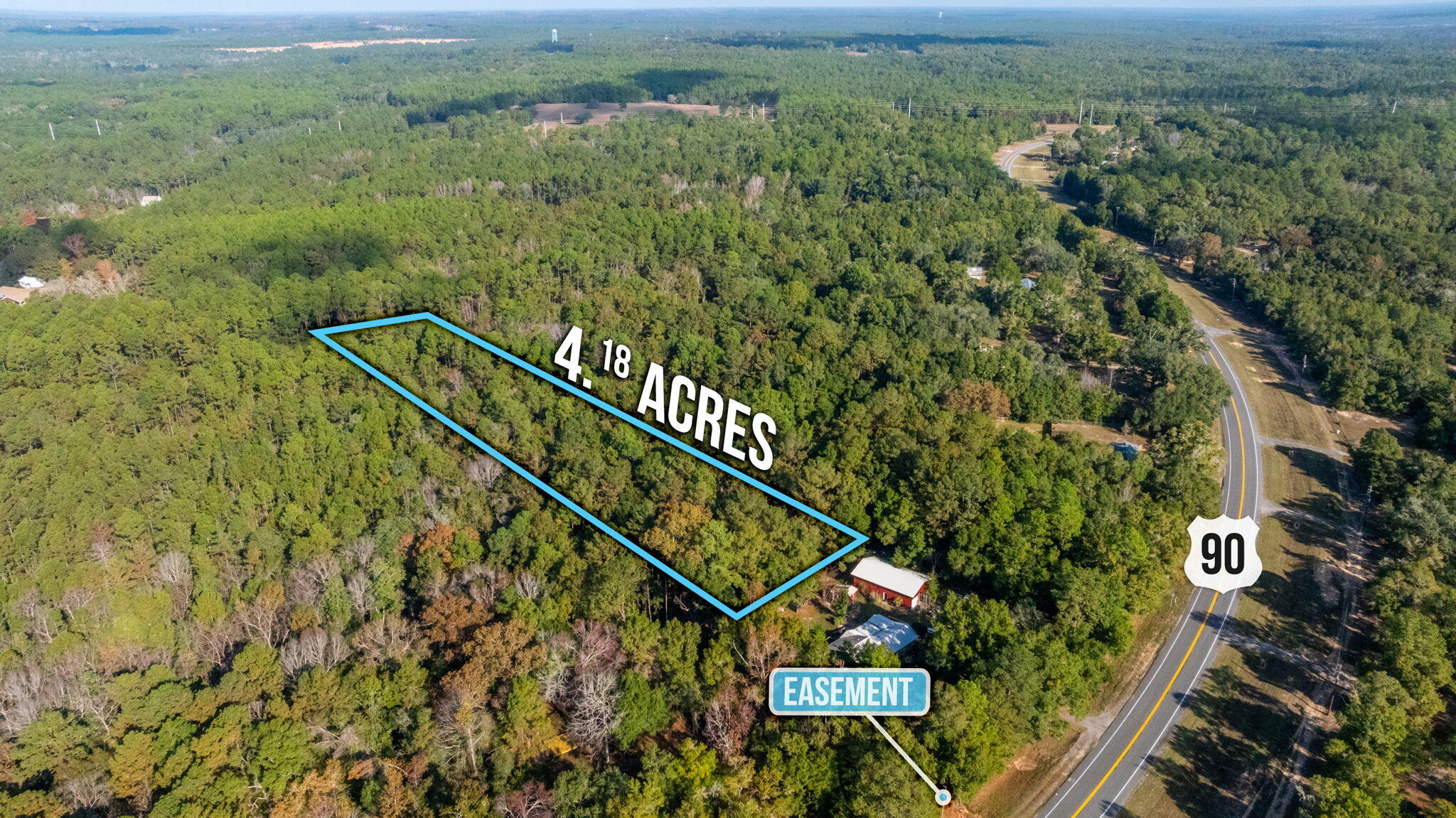 90 West Baker Baker, FL 32531 - Photo 5 of 10 a view of a city with lush green forest