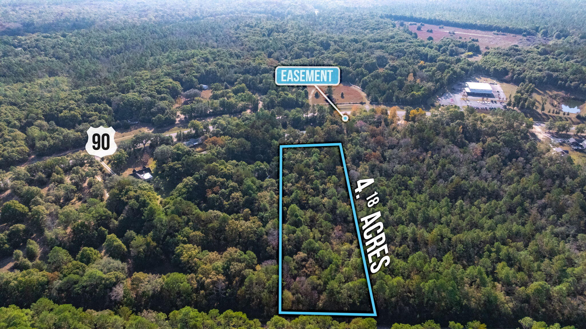 90 West Baker Baker, FL 32531 - Photo 7 of 10 an aerial view of houses covered with trees