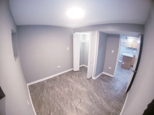 a kitchen with stainless steel appliances granite countertop a stove a sink and a granite counter tops