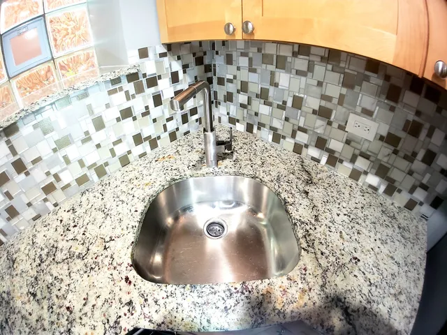 an empty room with a bathroom