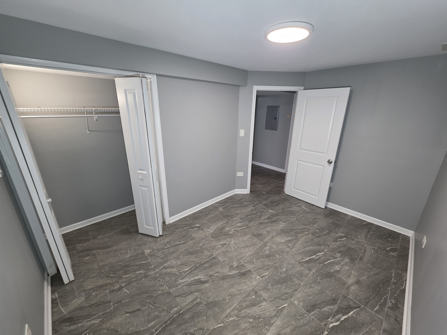 5134 West Henderson Street, Unit G Chicago, IL 60641 - Photo 33 of 47 an empty room with closet