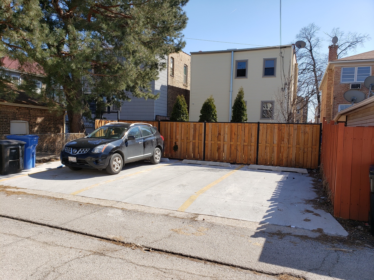 5134 West Henderson Street, Unit G Chicago, IL 60641 - Photo 46 of 47 a view of a car park in front of house