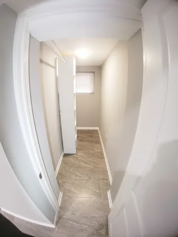 a view of kitchen and a window