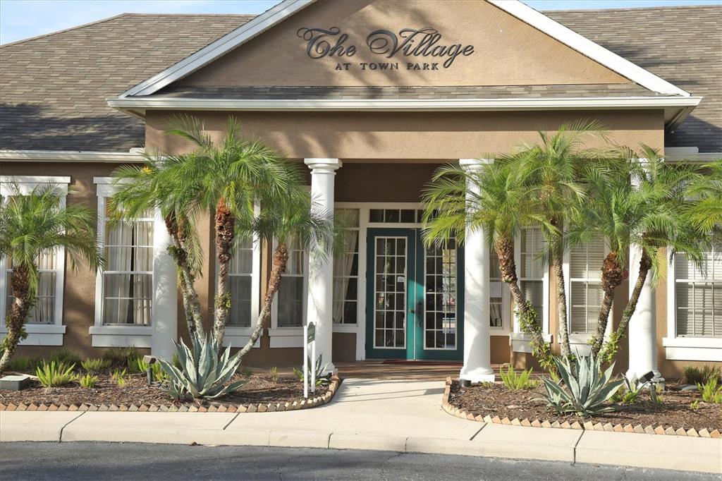 8932 Manor Loop, Unit 207 Lakewood Ranch, FL 34202 - Photo 23 of 33 a front view of a house