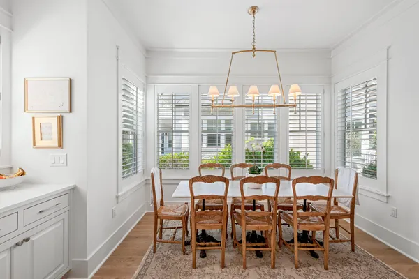 a view of a room with wooden floor and balcony