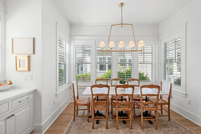 a view of a room with wooden floor and balcony
