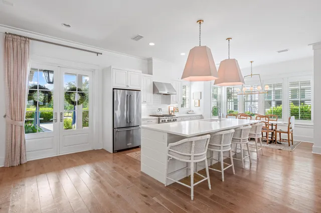 a view of a dining room with furniture window and outside view