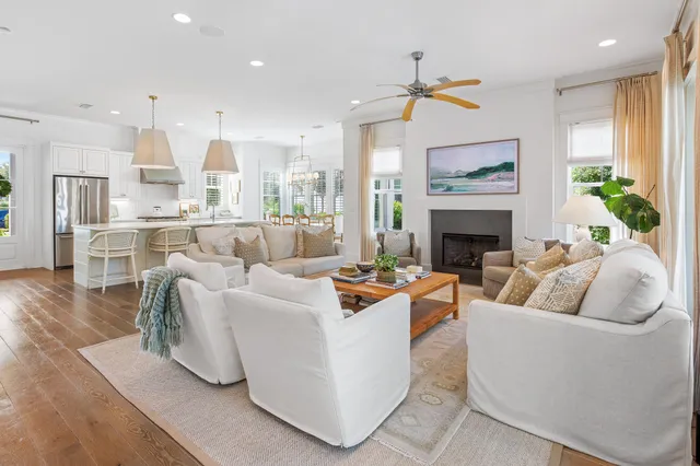 a bathroom with a granite countertop toilet a sink and a mirror