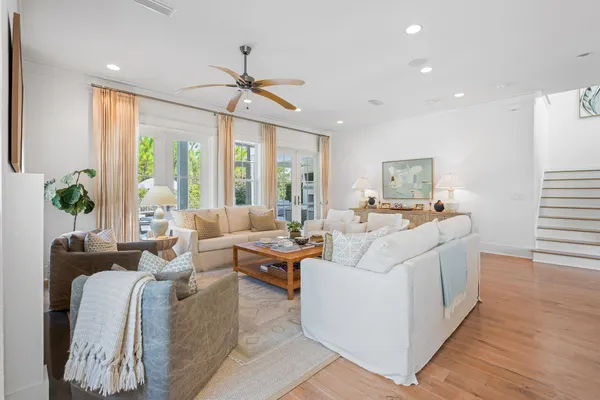 a living room with furniture and a table