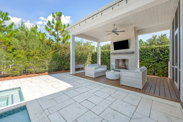 a spacious bathroom with a granite countertop sink a mirror and vanity