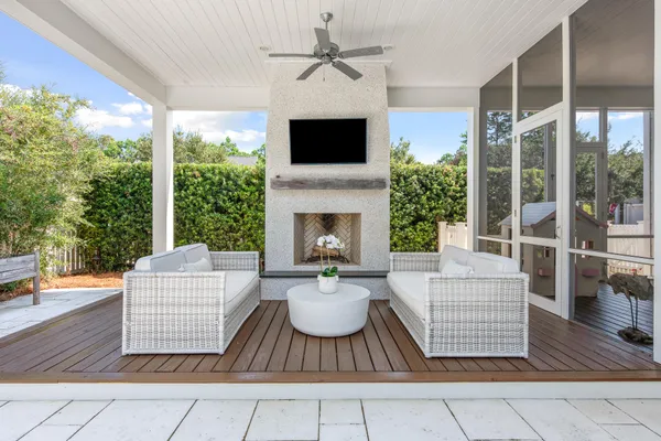 a bedroom with two beds and a large window