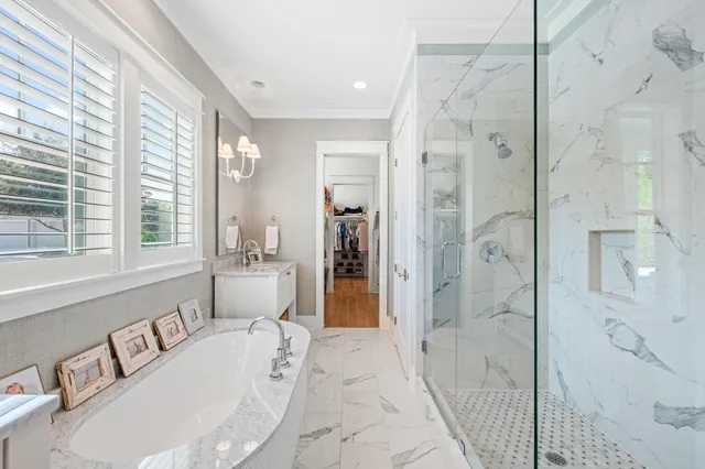 a view of a house with porch and garden