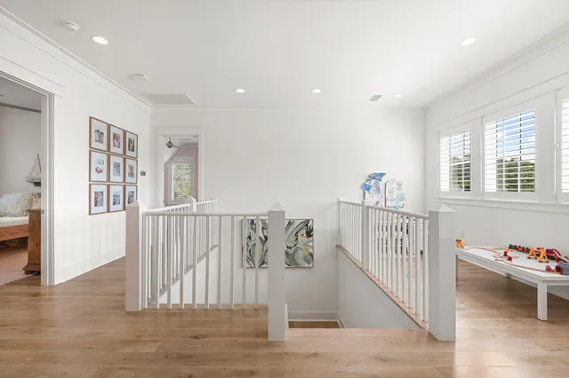 an aerial view of house with yard and lake view