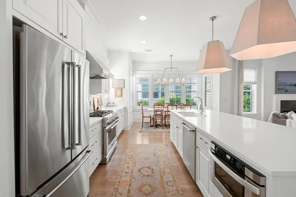a living room with furniture fireplace and flat screen tv