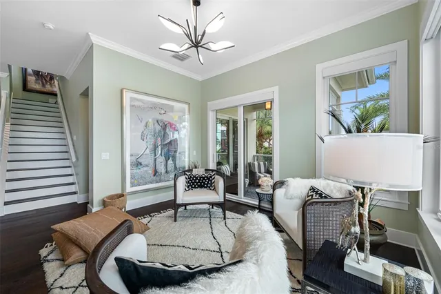 a kitchen with a sink and a potted plant