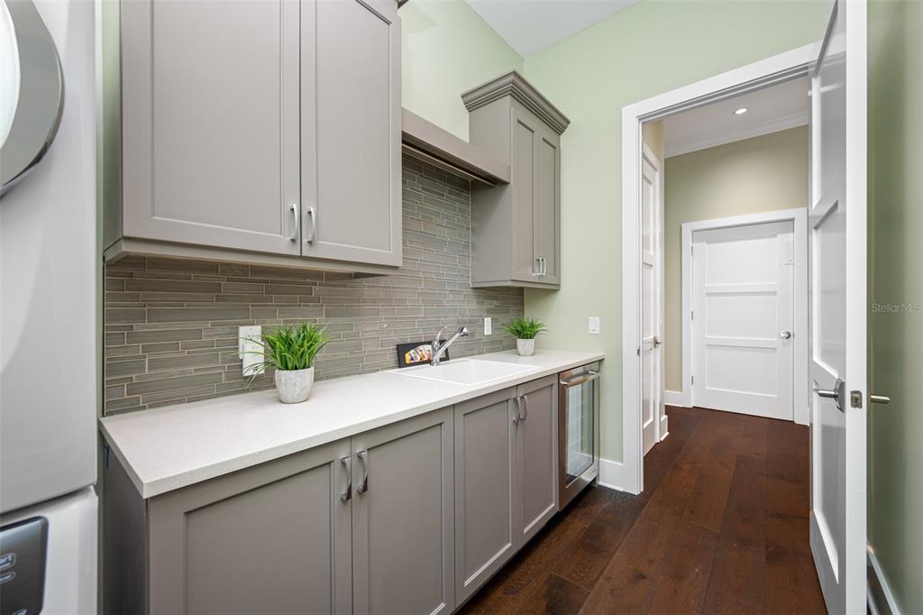 6 Hibiscus Lane Belleair, FL 33756 - Photo 25 of 65 a kitchen with a sink a stove and cabinets