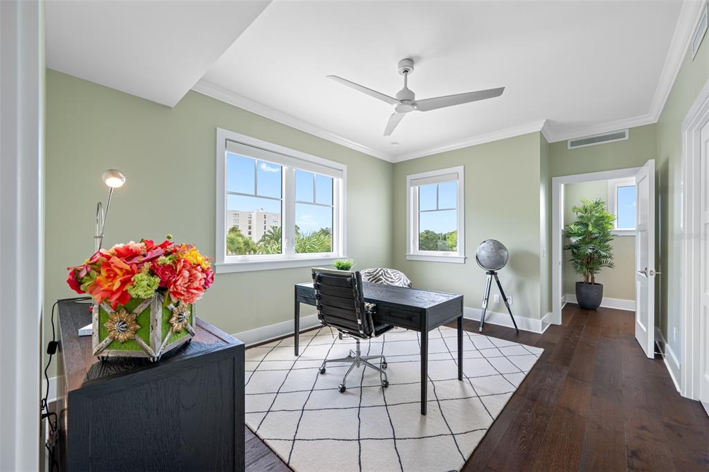 6 Hibiscus Lane Belleair, FL 33756 - Photo 46 of 65 a living room with furniture and a table
