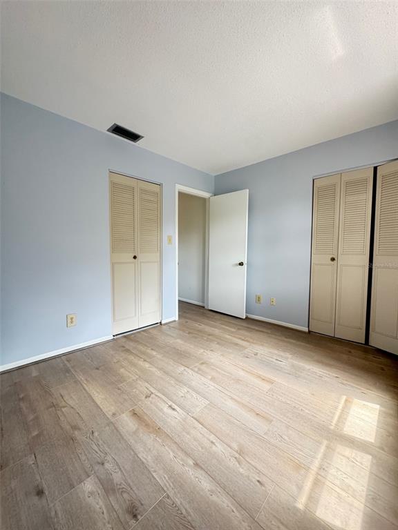 210 Elliot Avenue, Unit 135 Sarasota, FL 34232 - Photo 25 of 26 a view of an empty room with a window