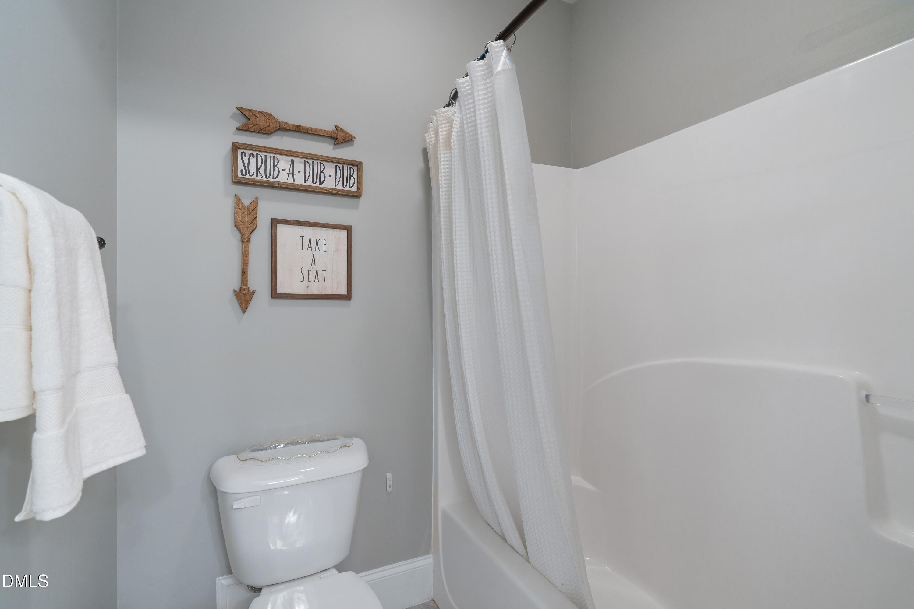 3353 Cheswick Drive Raleigh, NC 27609 - Photo 36 of 53 a bathroom with a toilet and a shower