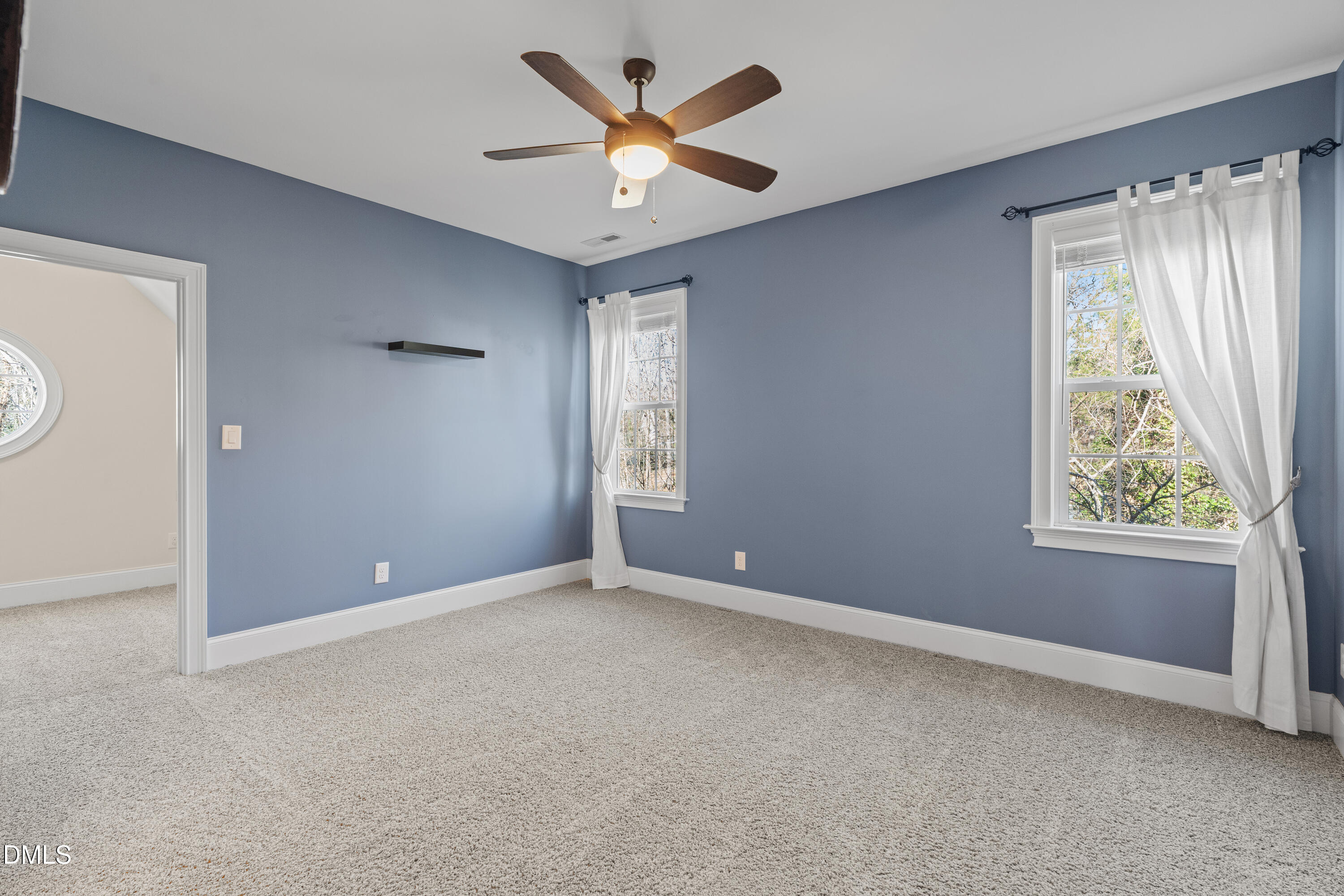 3353 Cheswick Drive Raleigh, NC 27609 - Photo 37 of 53 a view of an empty room with a window