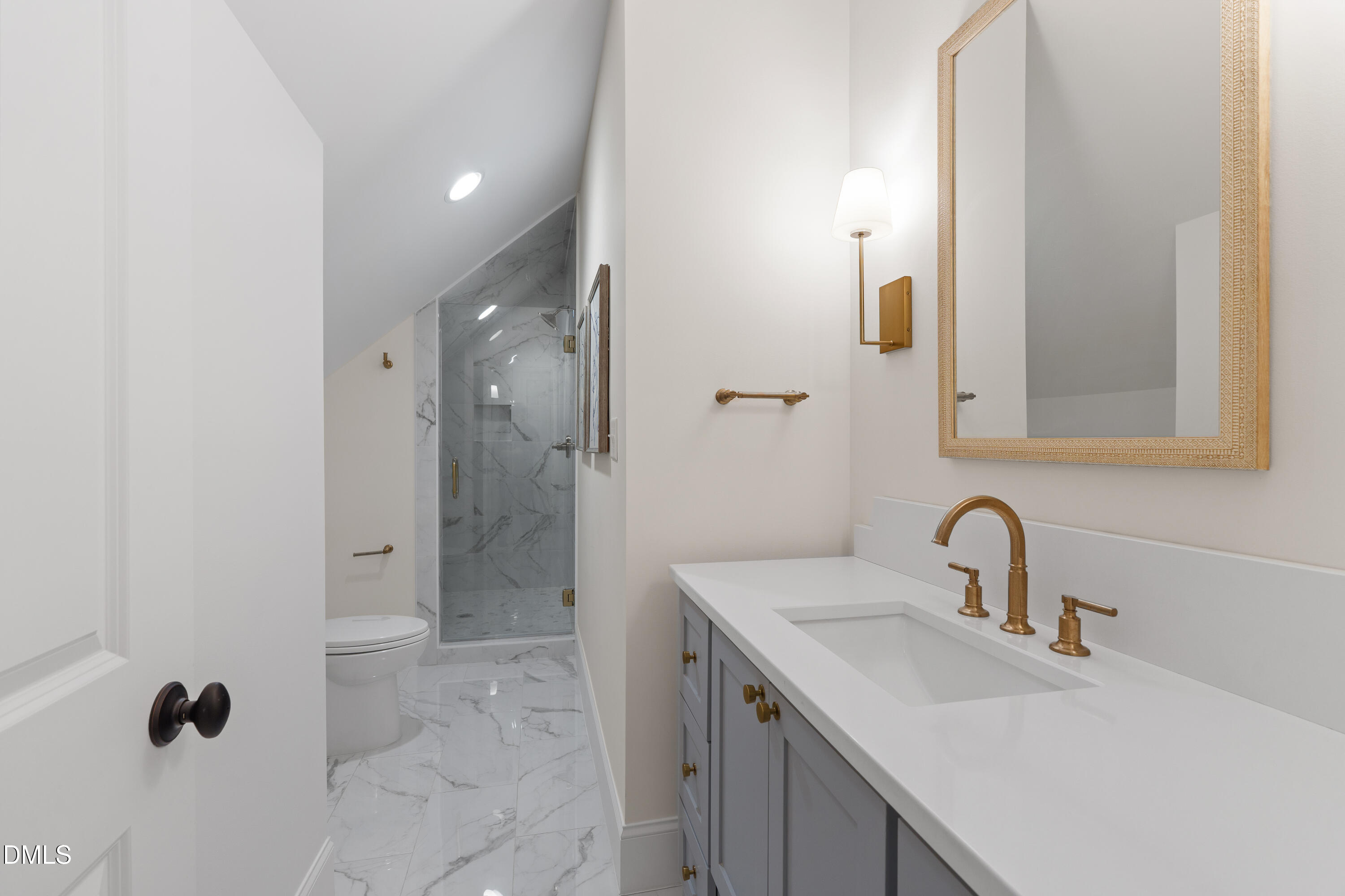 3353 Cheswick Drive Raleigh, NC 27609 - Photo 45 of 53 a bathroom with a sink shower and a mirror