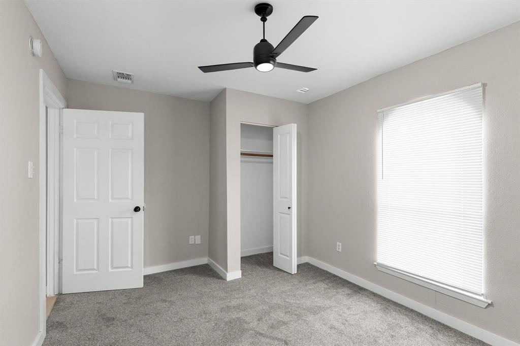 1002 Wembley Road Arlington, TX 76014 - Photo 17 of 20 a view of empty room with ceiling fan
