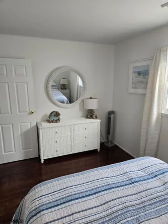 an aerial view of a city and ocean view