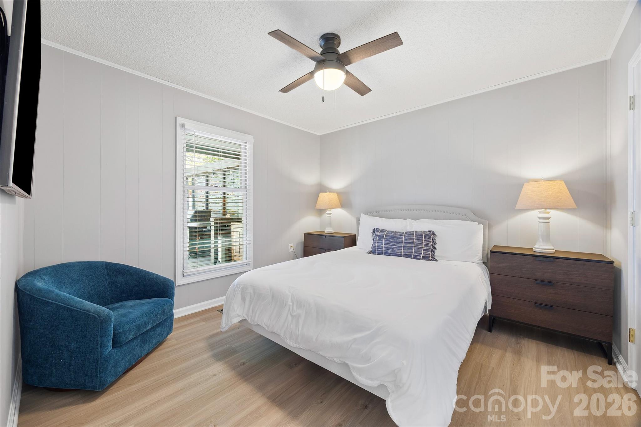 5280 Masons Ferry Road Clover, SC 29710 - Photo 22 of 45 a bedroom with a bed couch and window