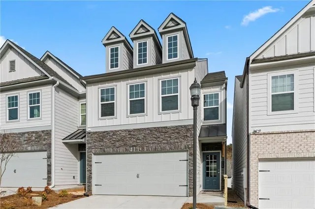 a front view of a house with windows