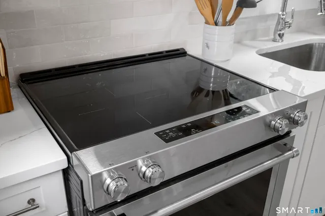a view of staircase with wooden floor