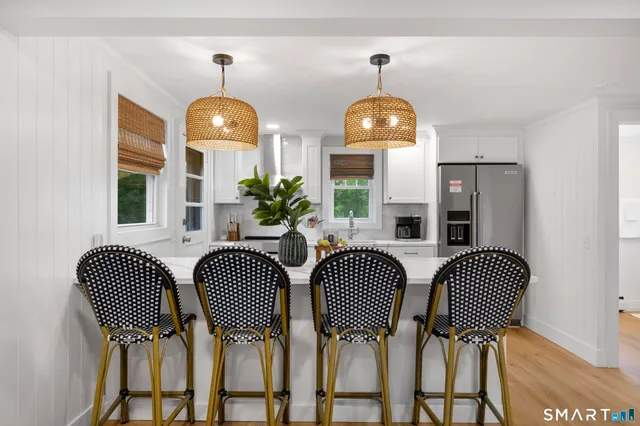 a view of a livingroom with furniture chandelier