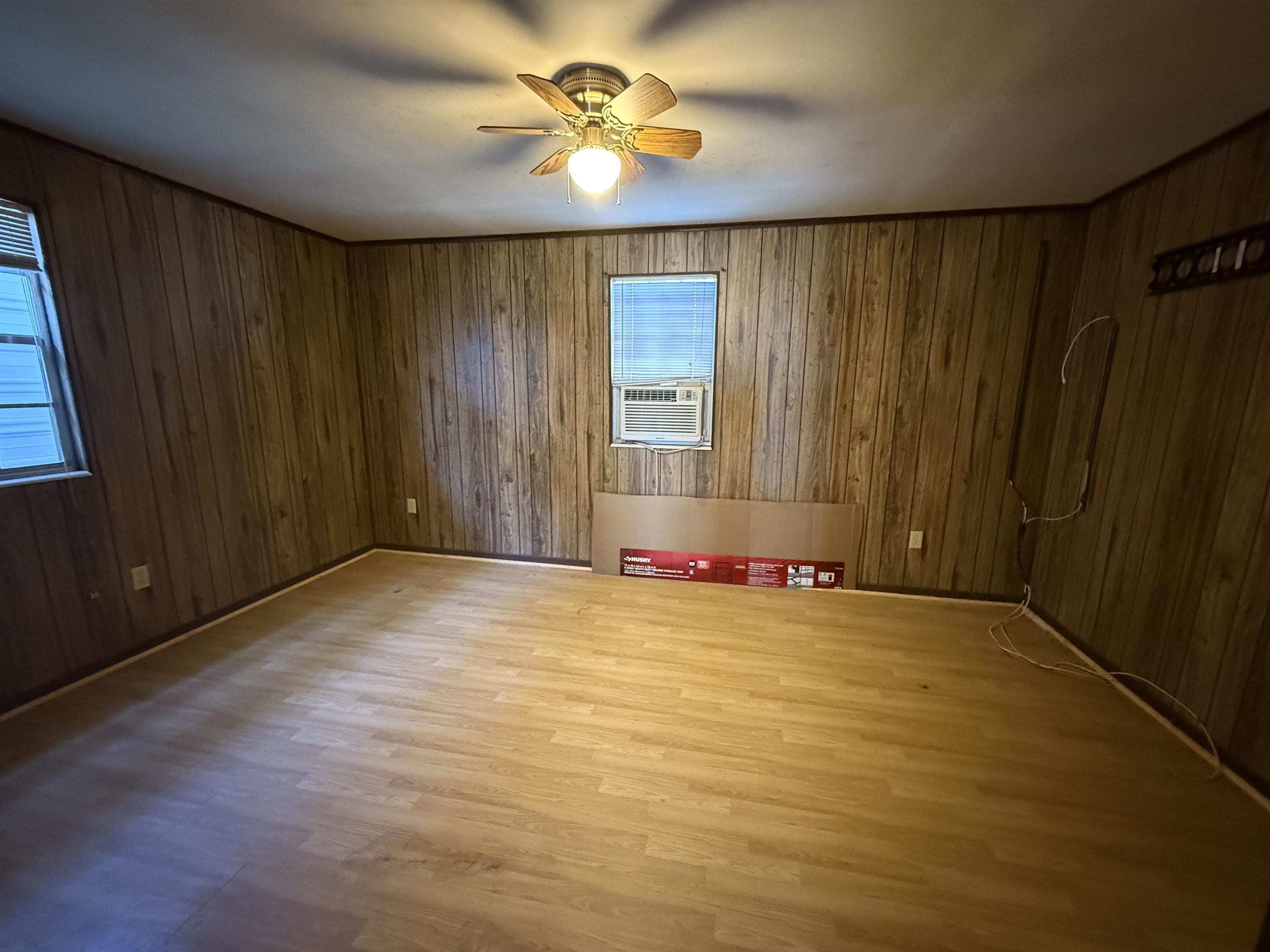211 Cedar Creek Road Palatka, FL 32177 - Photo 12 of 24 an empty room with windows and fan
